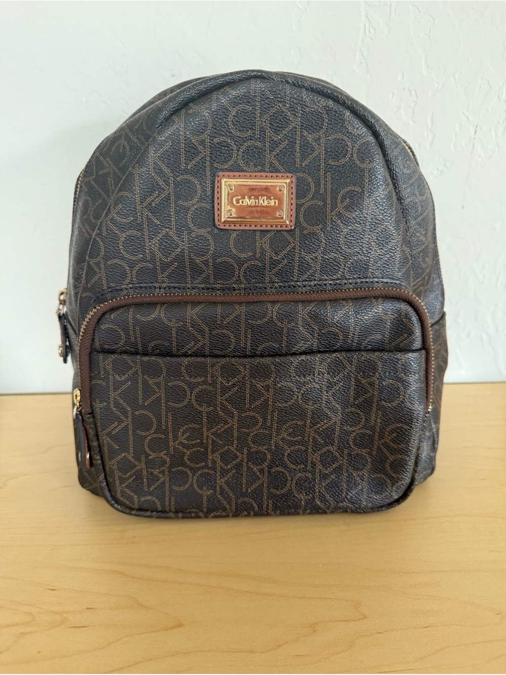Calvin Klein Monogram Brown Faux Leather Small Key Item Backpack Purse